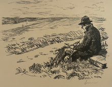 Charger l'image dans la galerie, L'artiste dessinant sur le motif, une pierre lithographique à ses côtés.