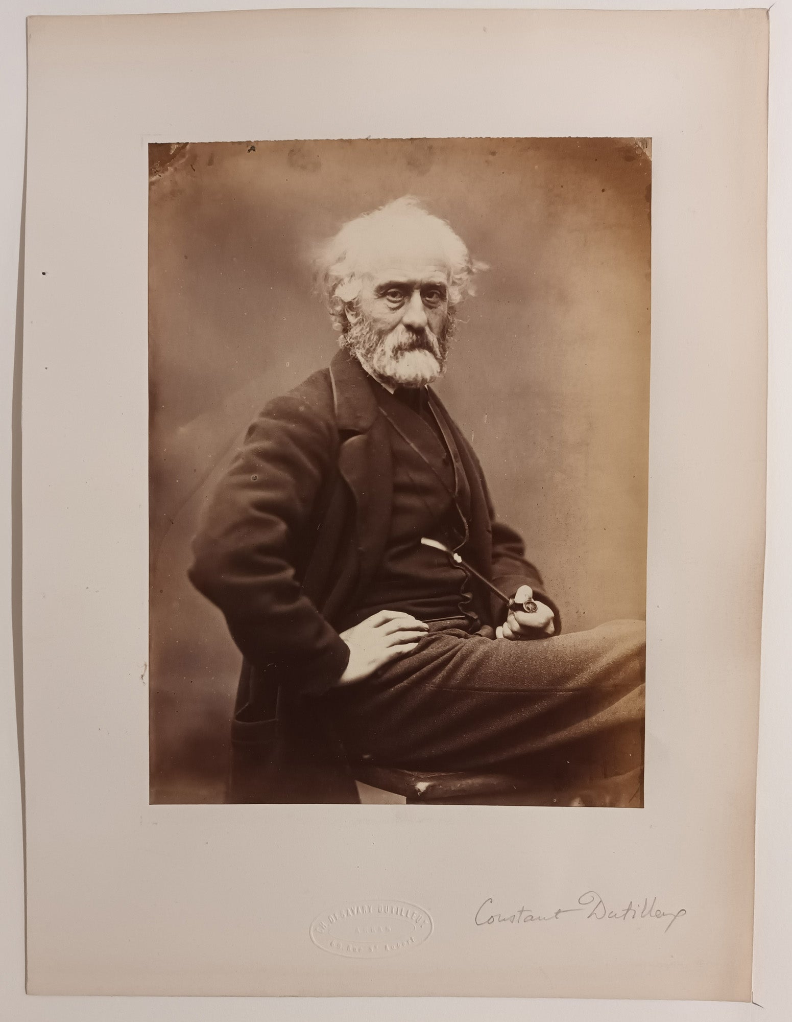 Autoportrait de Constant Dutilleux, assis de trois-quart face.