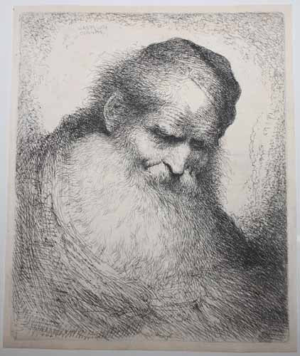 Le vieux avec une grande barbe.