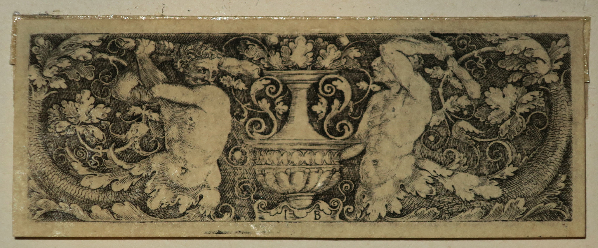 La vignette aux deux tritons.