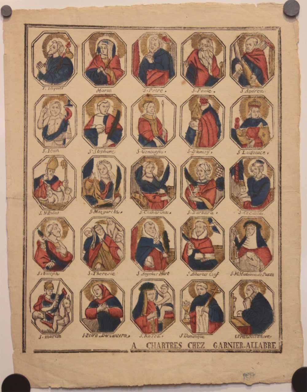 Page de 25 figures de Saints et de Saintes, dans des octogones.
