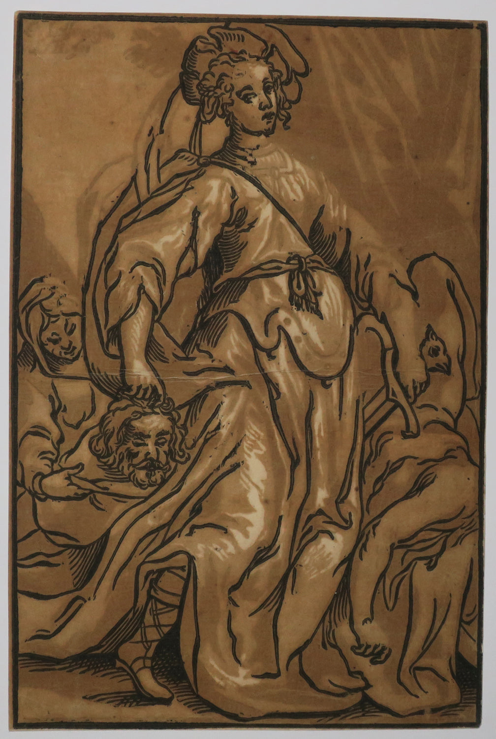 Judith tenant la tête de Holopherne.