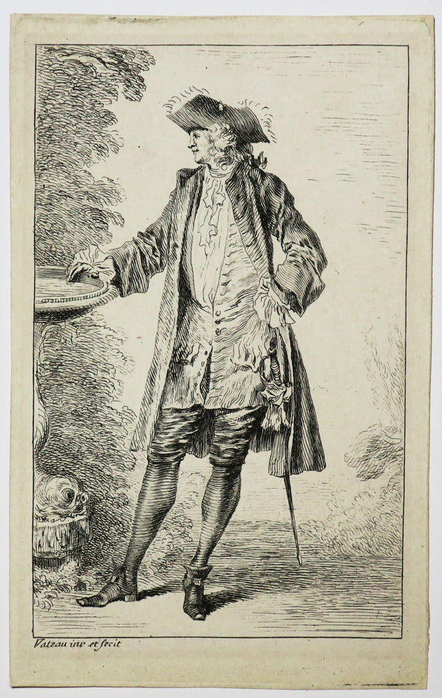 Un homme appuyé à une vasque.