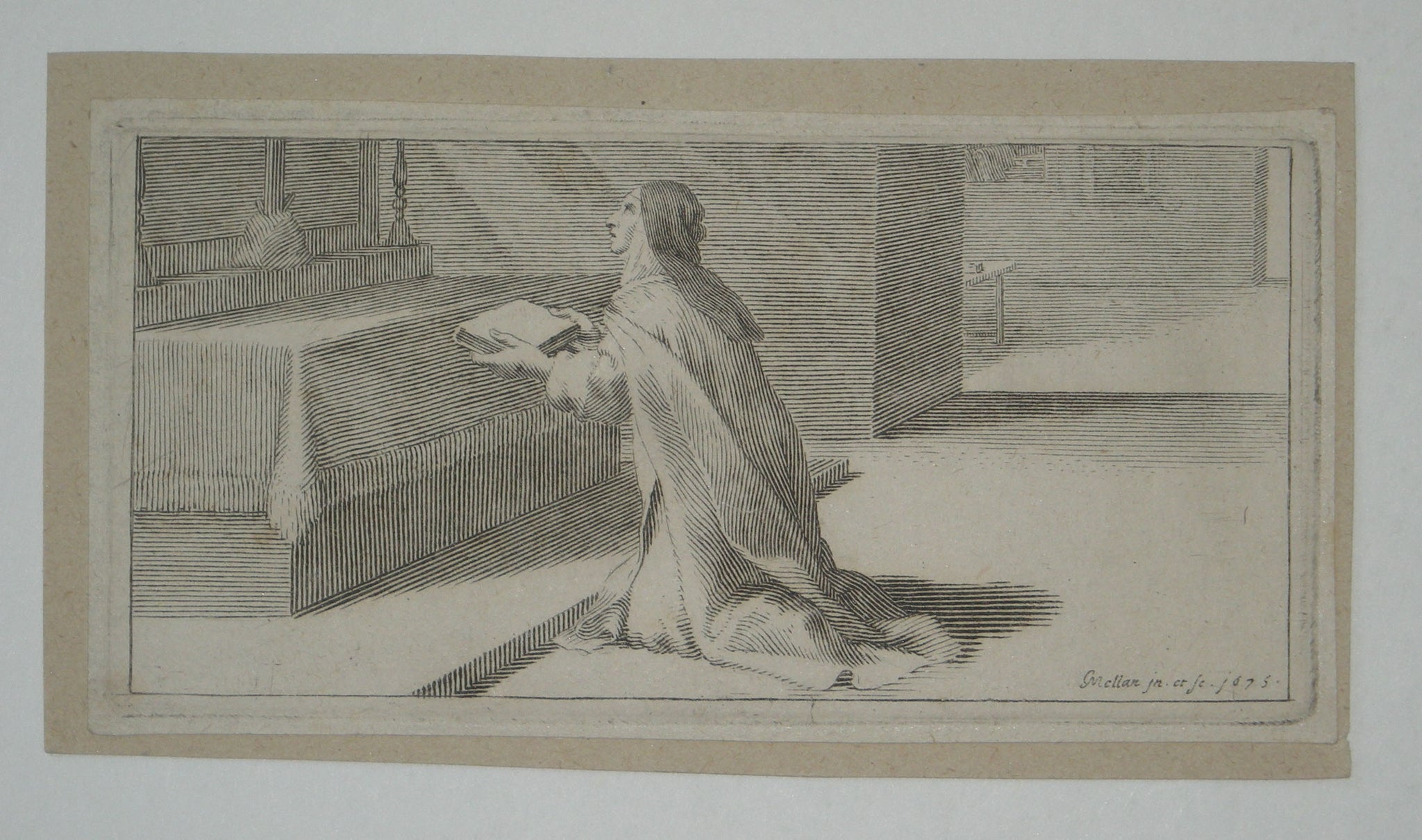 Sainte Thérèse tenant un livre.