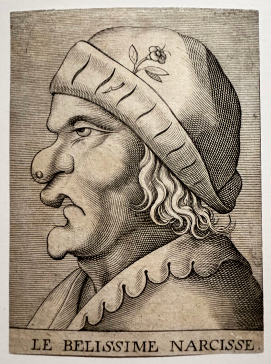 Le belissime Narcisse (Visage grotesque). Gravé par un anonyme français du 17ème.