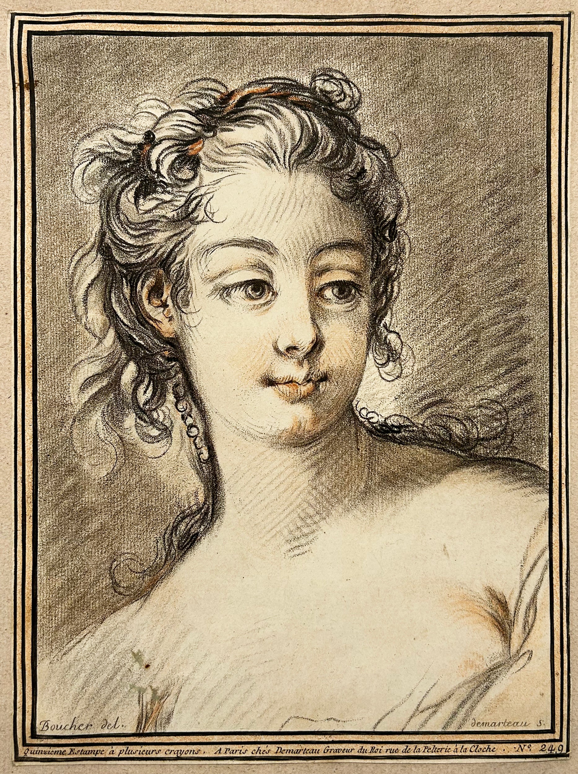 D'après François BOUCHER - Tête de femme, de face, cheveux relevés, un fil de perles tombant derrière l'oreille. Gravure à la manière du crayon par Gilles Demarteau l'aîné.