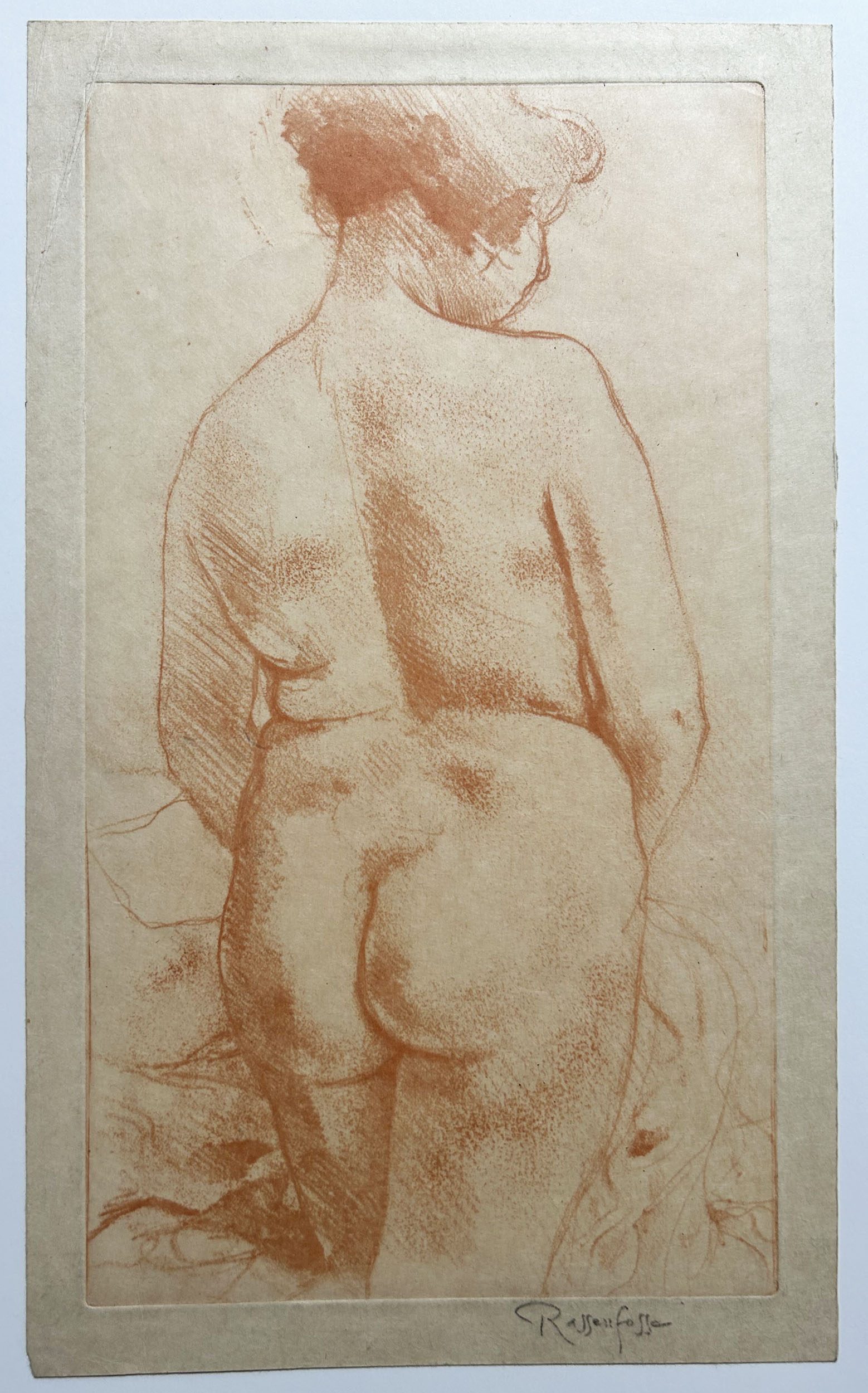 Armand RASSENFOSSE - [Femme dénudée, debout et de dos]. Gravure à la sanguine, signée. 