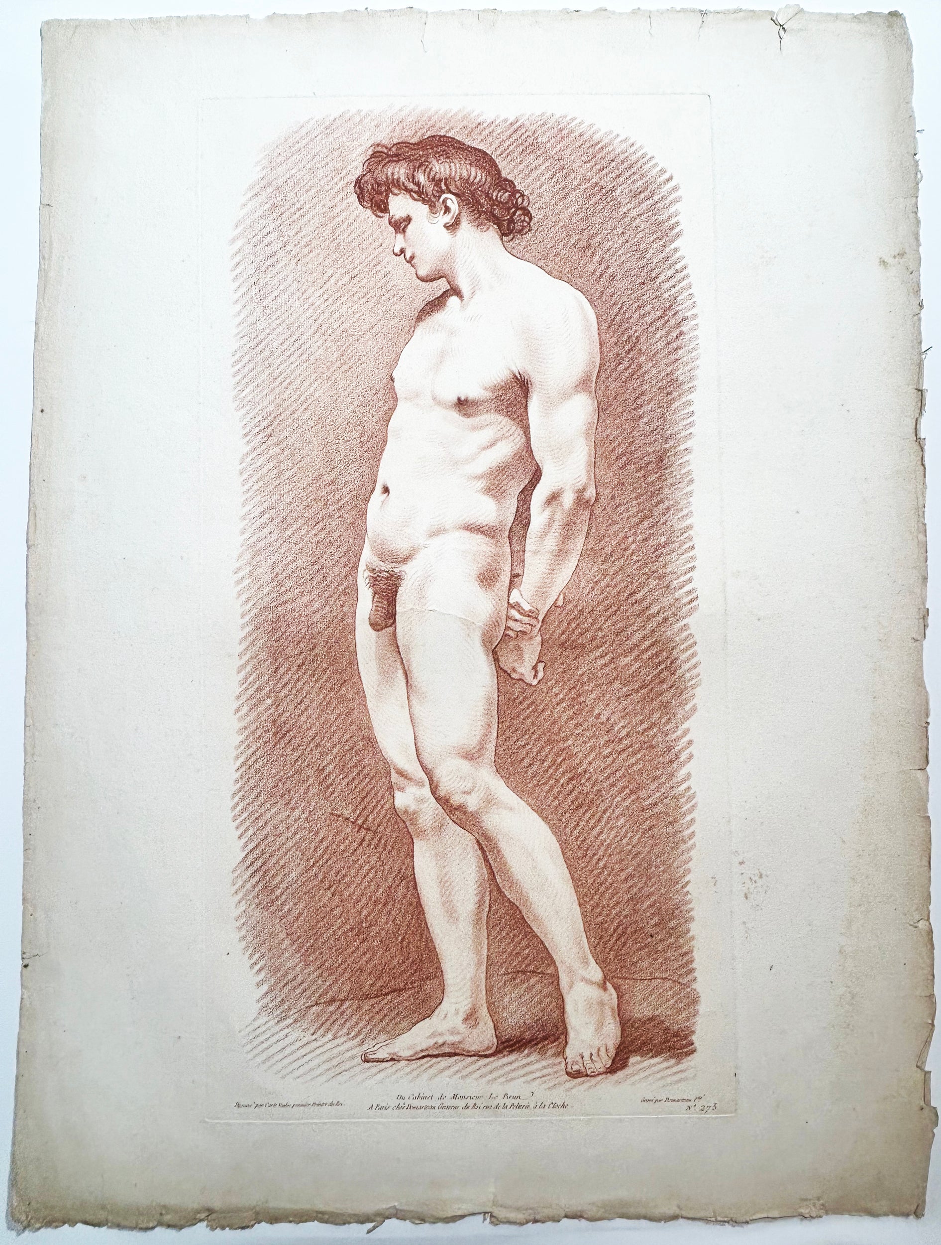 Gilles DEMARTEAU - Jeune homme nu, debout, les mains croisés derrière le dos. Gravure à la manière du crayon d'après Carle Van Loo (Nice 1705 † Paris 1765), imprimée à la sanguine. 