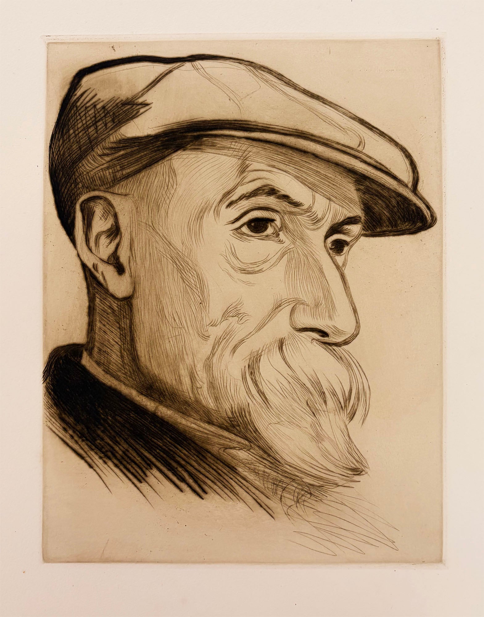 Raphaël SCHWARTZ - Portrait du peintre Renoir.  c.1912. Pointe sèche originale, imprimée en bistre. 
