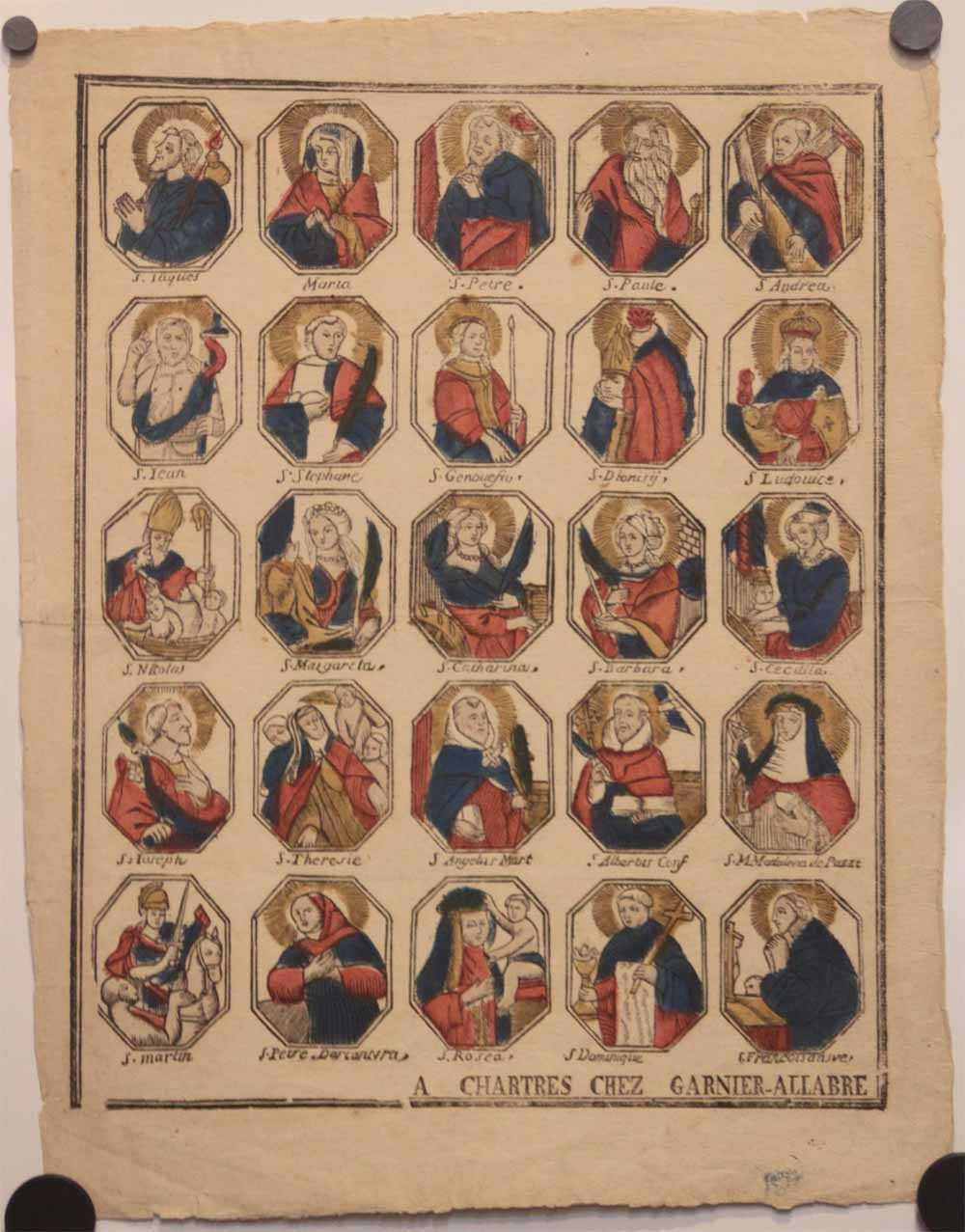 Page de 25 figures de Saints et de Saintes, dans des octogones. 