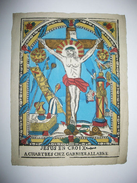 Jésus en croix (entouré des instruments de la Passion).