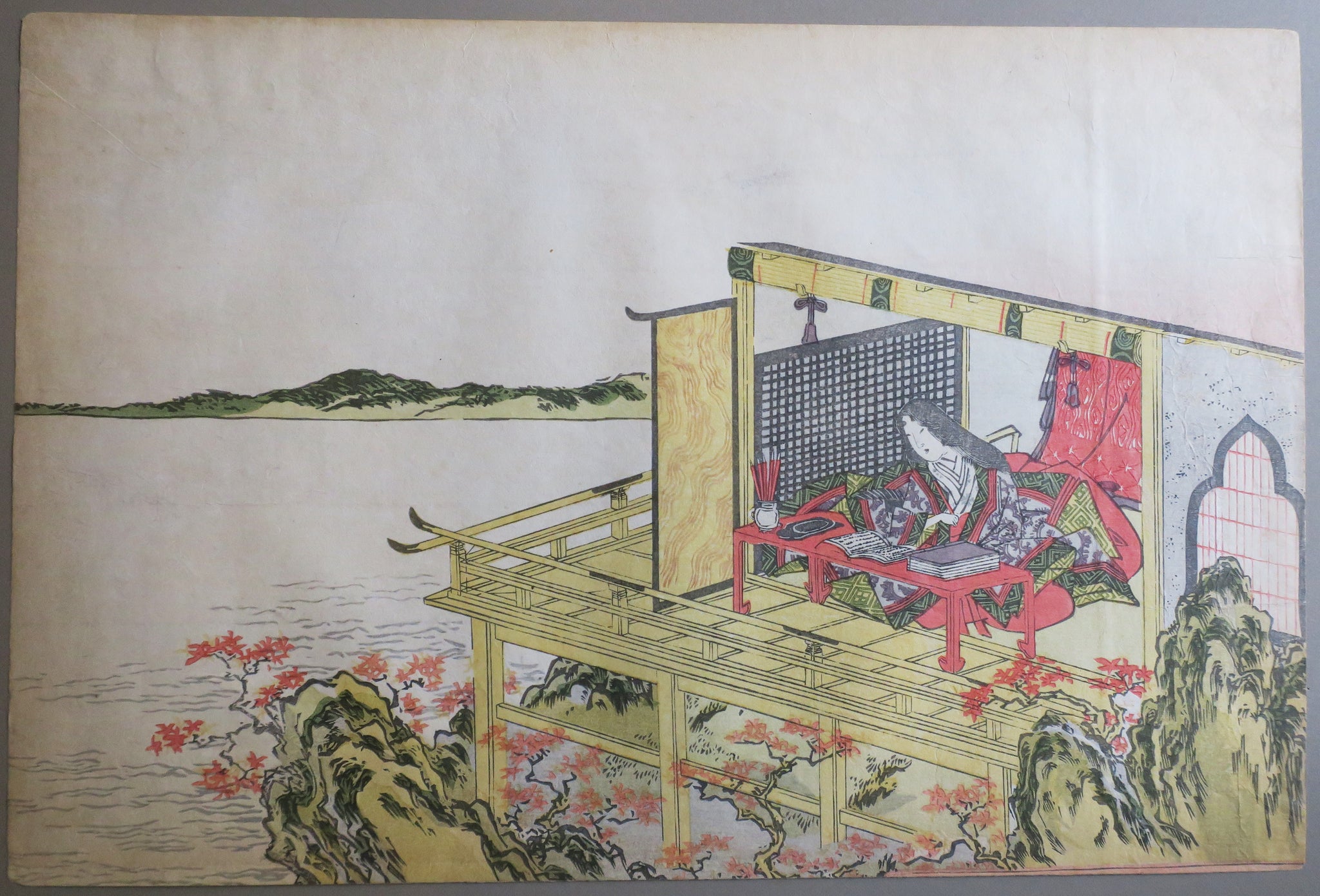 [Jeune femme écrivant dans un intérieur, proche d'une rivière]. 